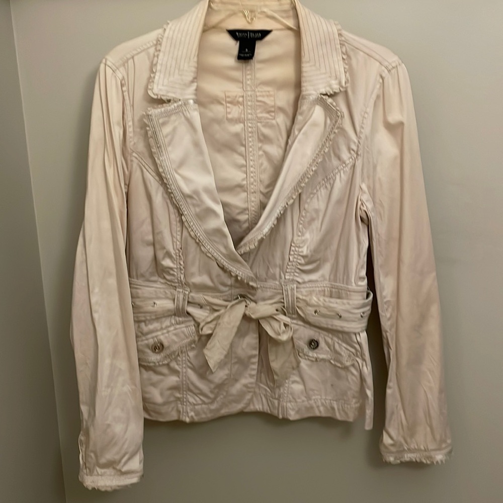 Jacket, is wrinkled from being in plastic bin